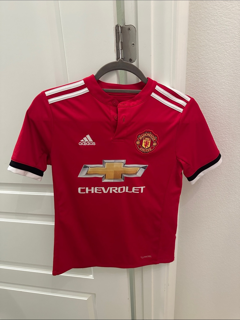 adidas Kids Red Manchester United Soccer Jersey with White Stripes